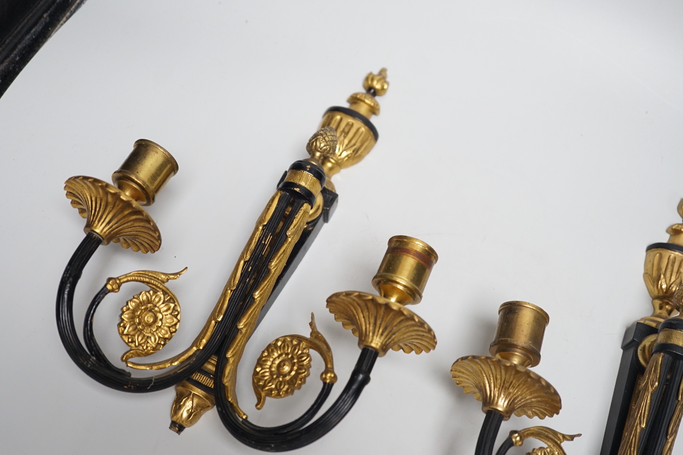 A pair of ormolu 2 branch wall lights, 32cms high